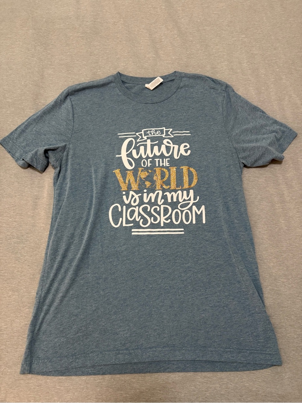 Bella Canvas Blue Graphic Tee with White and Gold Text